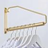 Brushed Gold Retractable Brass Wall-Mounted Clothes Hanger