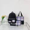 New schoolbag, primary school girl, lightweight stress relief, student backpack, fashionable plaid backpack, four-piece set