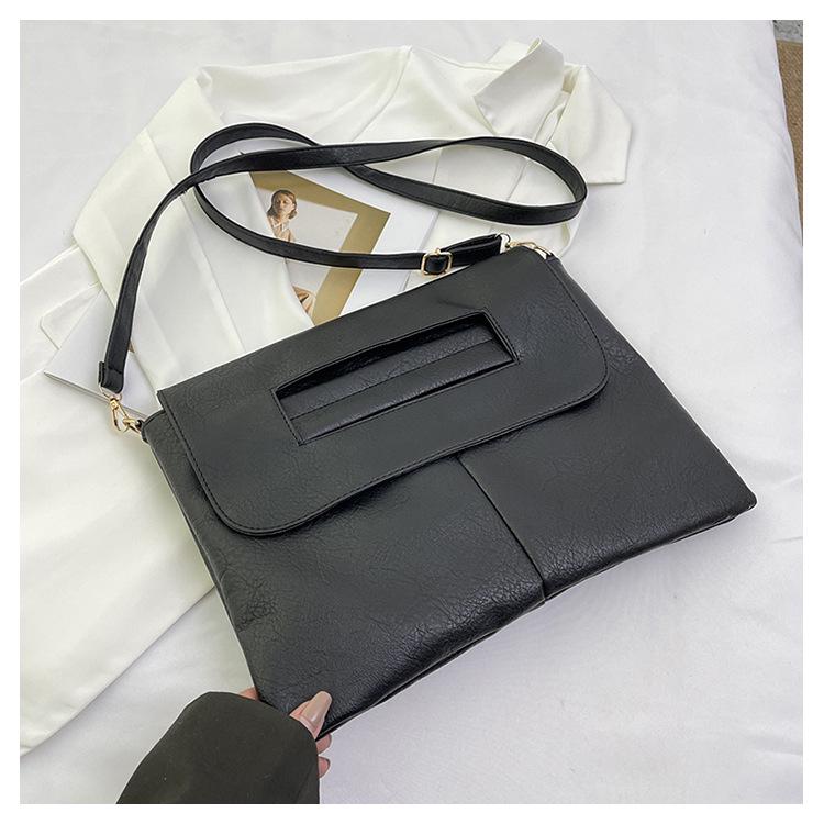 

Мягкая полиуретановая большая женская сумка кроссбоди - Коллекция Весна 2024: Тонкая, вместительная сумка для документов формата А4 и компьютера для поездок на работу