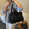 Stylish Canvas Shoulder Bag for Women with Wide Strap and Spacious Design