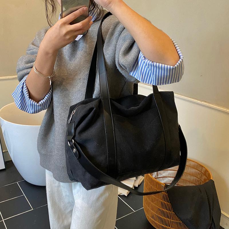 Stylish Canvas Shoulder Bag for Women with Wide Strap and Spacious Design