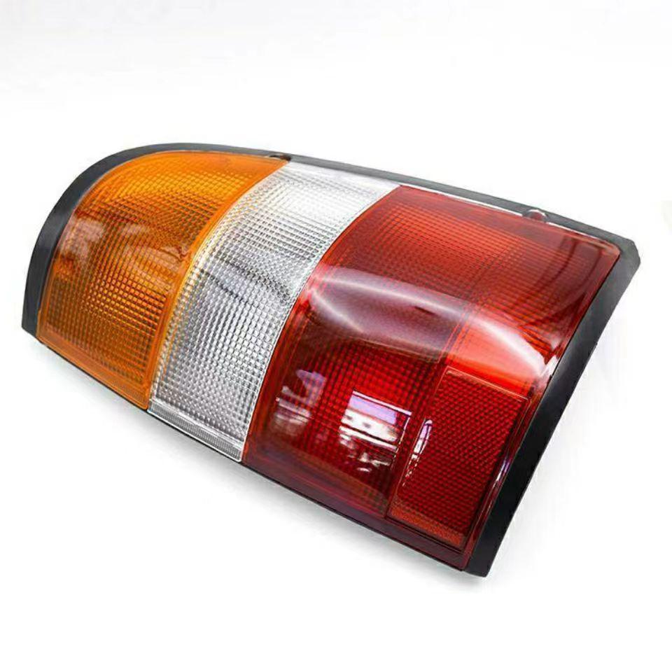 Isuzu Qingling Pickup Truck Rear Tail Light Assembly for 1998 Model - Includes Reverse and Brake Light Bulb.