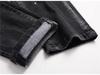 European Spring Trend: Men's Black & Gray Splatter Paint Ripped Skinny Jeans