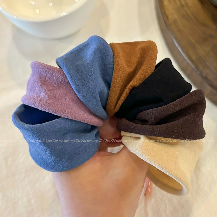 Hochelastisches Haargummi: Damen-Stirnband mit breiter Kante für Pferdeschwanz