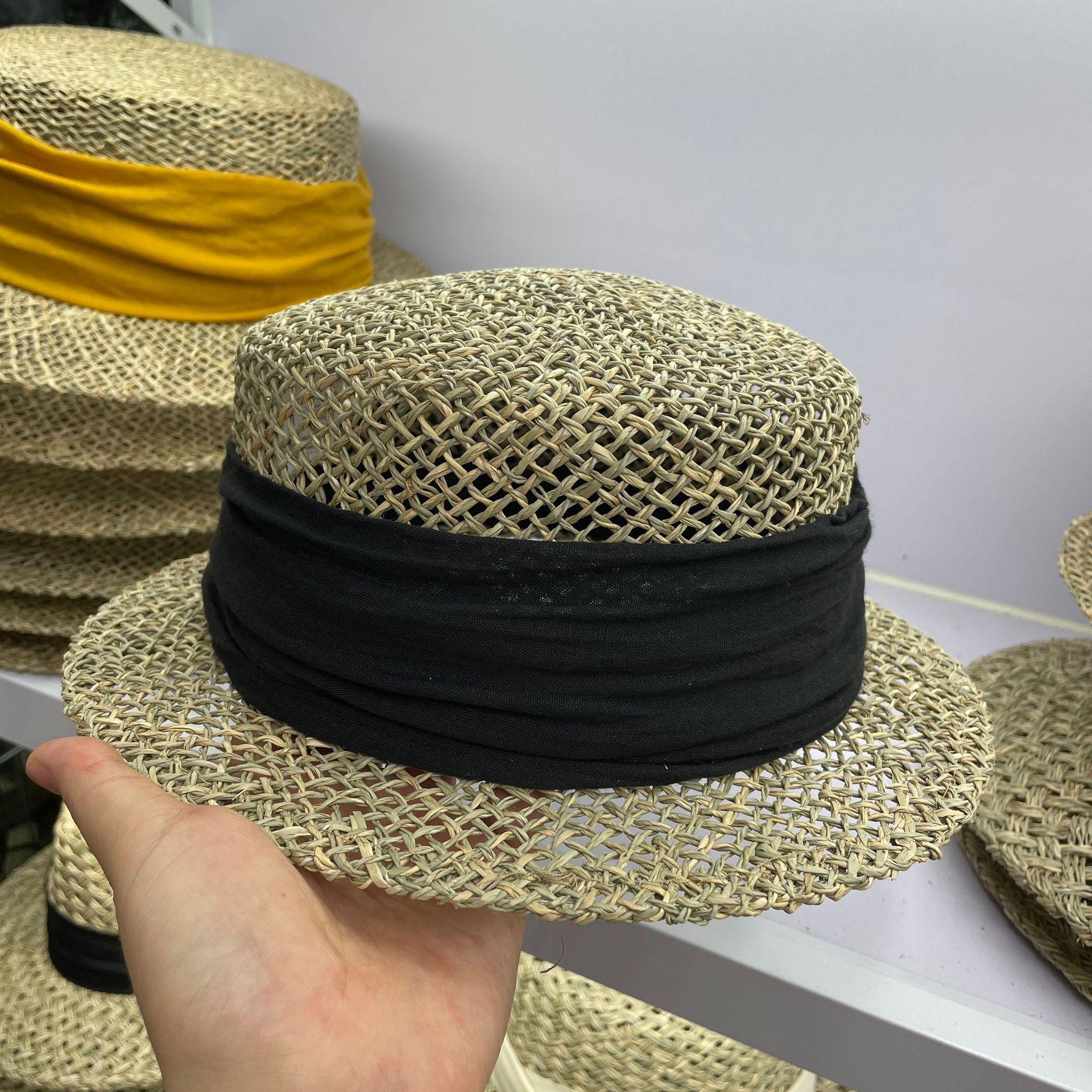 

Retro style salty grass woven hat 2026 new women s summer French sun hat hollowed out Japanese flat top top hat