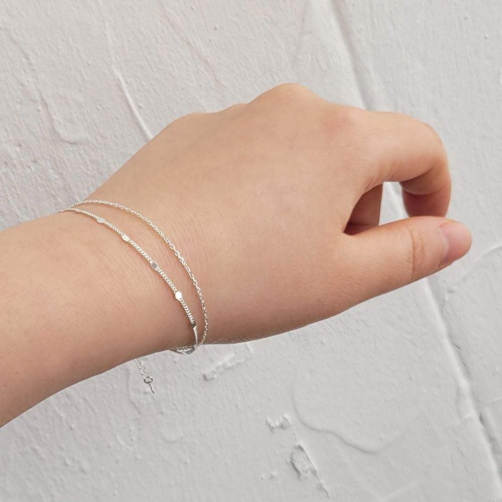 

A sparkling two-line silver chain bracelet, a gift for a coworker or girlfriend, silver jewelry, 925 silver. Silver