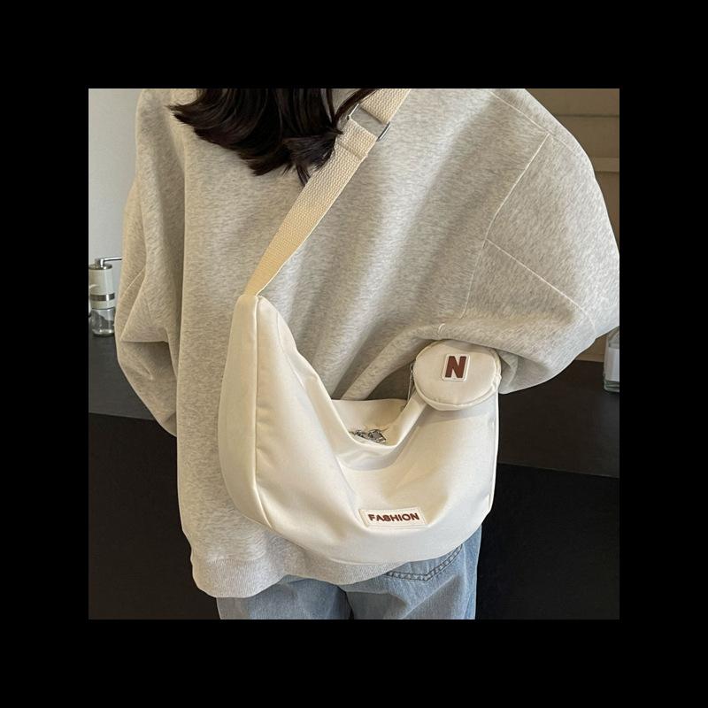 New casual large-capacity solid color fashionable versatile shoulder nylon waterproof student commuting ladies messenger bag