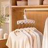 Portable Five-Hole Folding Clothes Hanger for Travel, Dormitory, Hotel, and Indoor Drying.