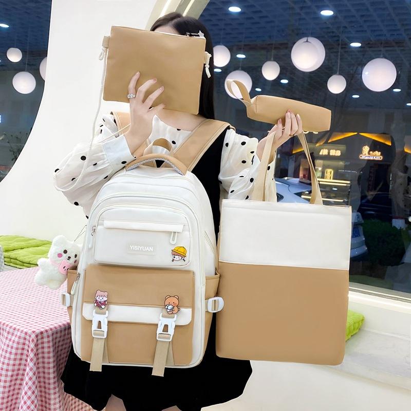 Small, fresh and large-capacity junior high school schoolbag women's casual and durable backpack three-piece schoolbag