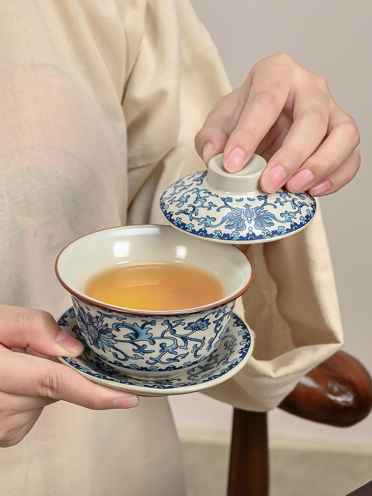 Sancai Gaiwan Tea Set: Ceramic Anti-scalding Tea Cup with Hand-held Pot for Gongfu Brewing.