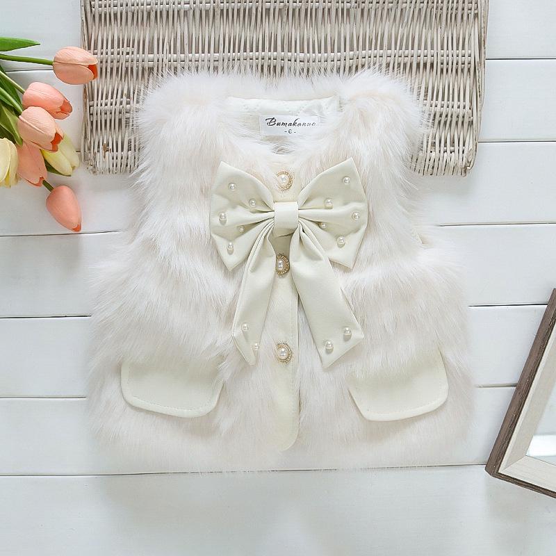 

Модный детский жилет на осень/зиму с бантом 140 cm белый