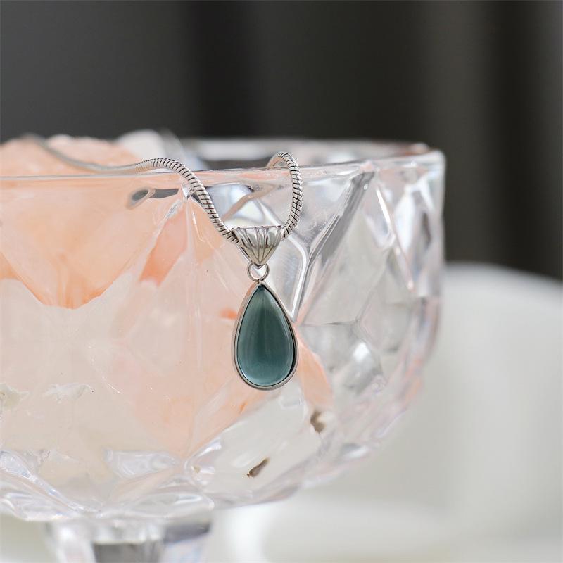 French Transparent Green Water Drop Ocean Necklace with Snake Bone Chain - Fashionable Gold-Plated Titanium Steel.