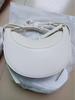 French Niche Design Women's Lychee Pattern Crescent Shoulder & Crossbody Saddle Bag