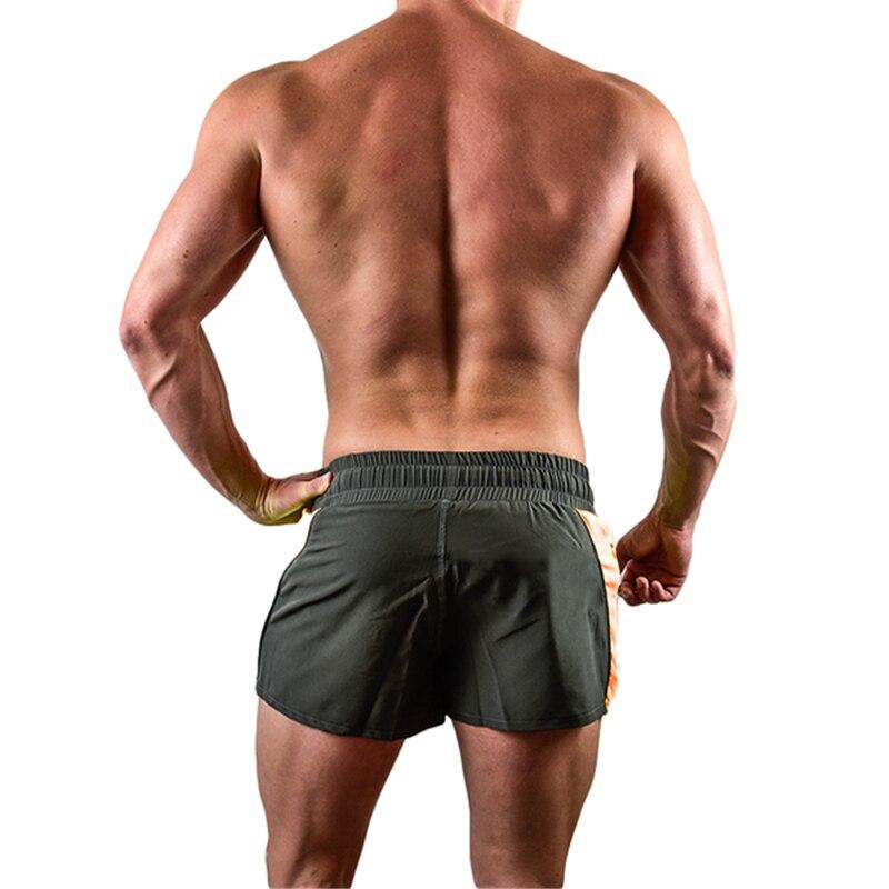 Muscleguys American Fitness Schnelltrocknende Sommer-Sportshorts Herren Laufen Atmungsaktiv Dreipunkt-Hose Nicht knielang Basketballhose