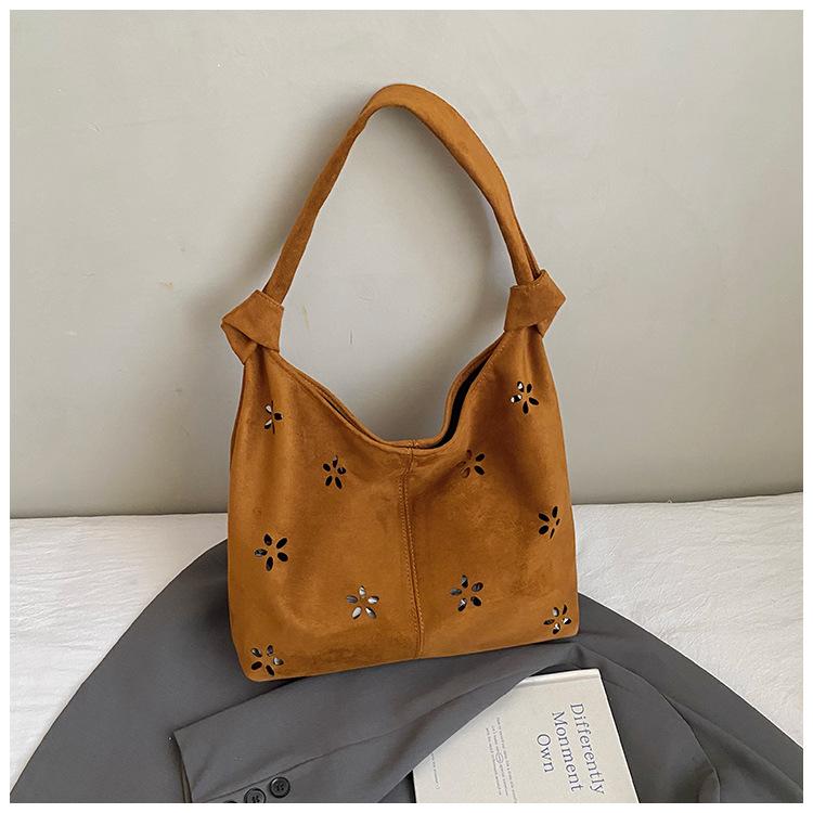 Tasche im College-Stil Damen lässige hohle Tragetasche ausländischer Stil Wildleder Umhängetasche Damen Pendler Achseltasche