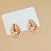 Gold-Tone Geometric Twist Earrings: Fashionable and Versatile Multi-Layer Braided Earrings for Women.