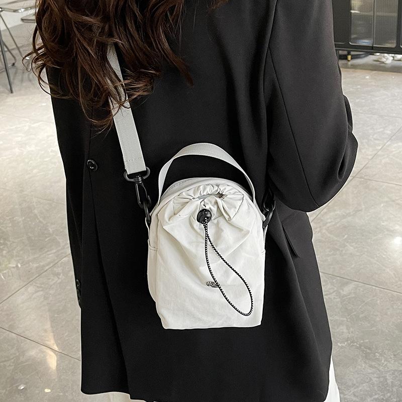 Kettle bag waterproof casual shoulder bag women's tide brand versatile mobile phone bag fitness walking messenger bag water cup cloth bag men