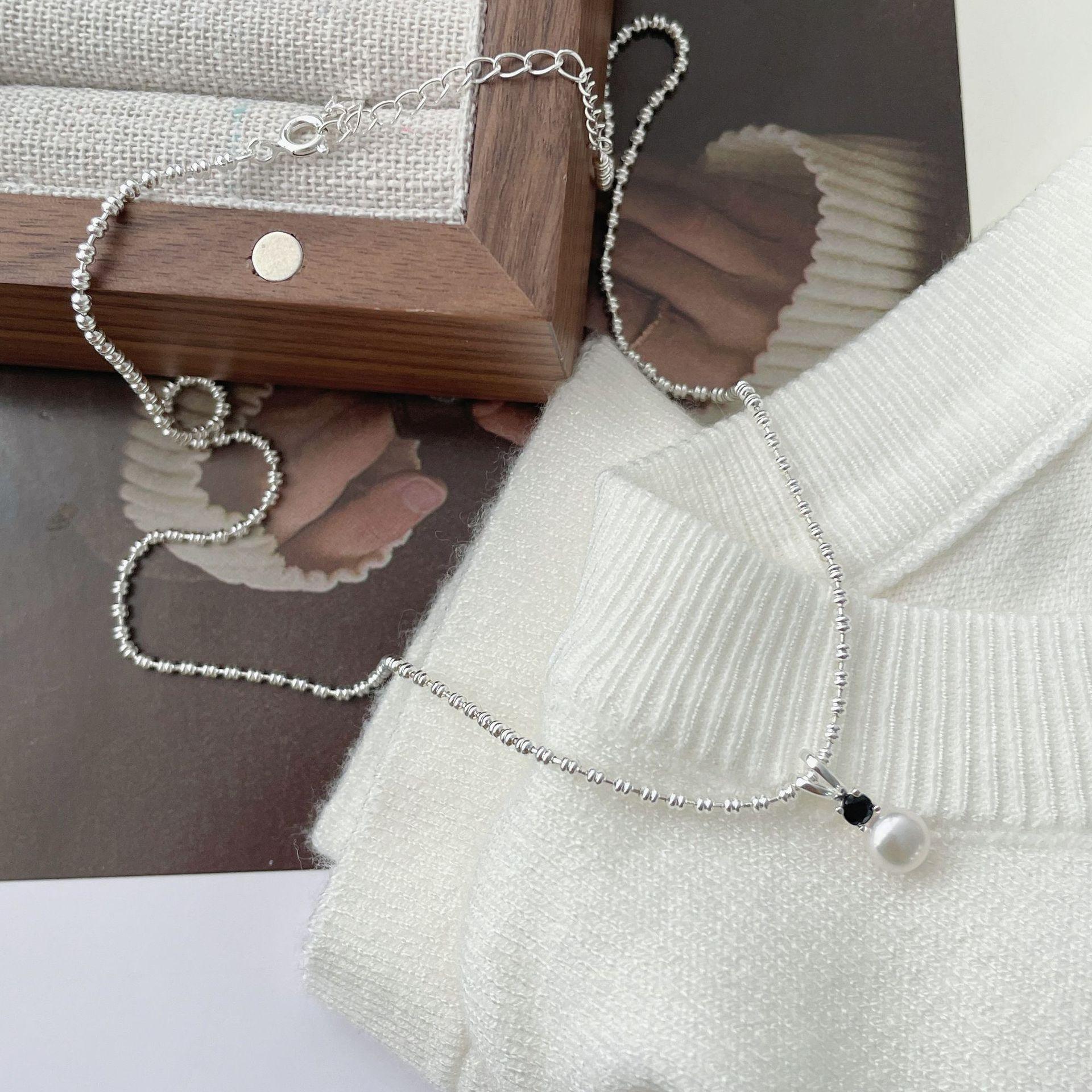 Gentle and sweet girlish heart temperament black zirconium collarbone chain simple S925 freshwater pearl necklace 925 sterling silver