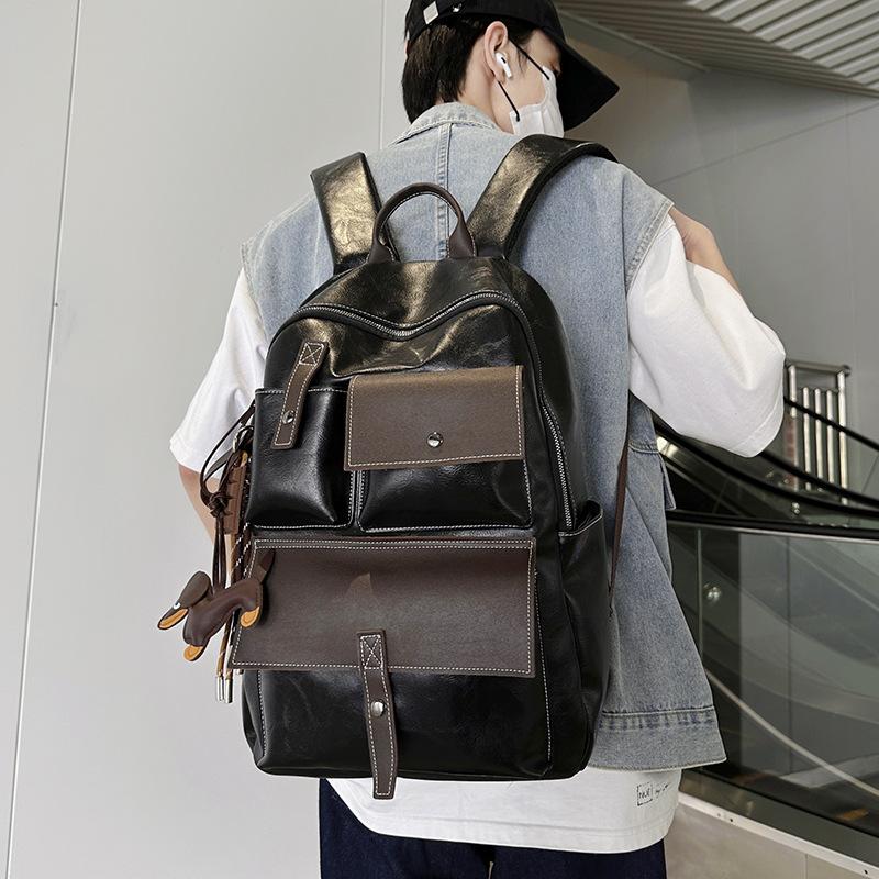 Schoolbag Hong Kong style retro backpack autumn and winter new simple PU large capacity student schoolbag versatile travel leisure backpack
