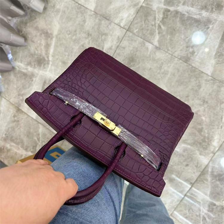 Pelle bovina primo strato motivo alligatore opaca portatile a spalla a tracolla borsa da donna premium transfrontaliera