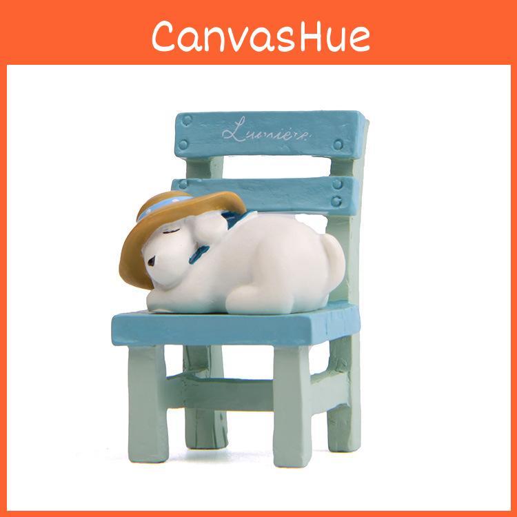 Harzornament Hund liegt auf dem Hocker für Geschenk Werbe- und Veranstaltungsgebrauch