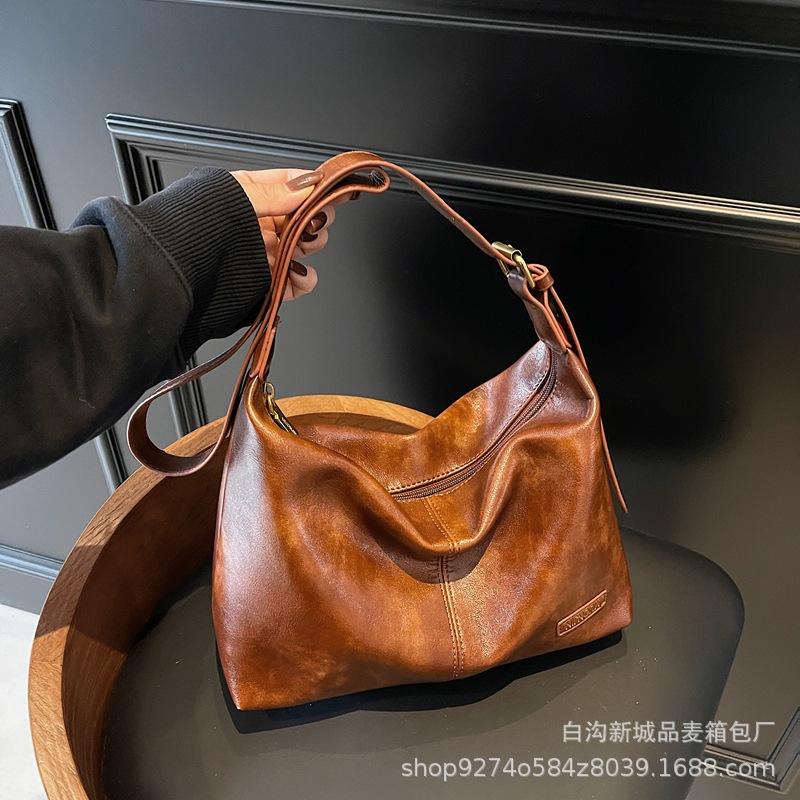 

Women s bag fashion new manufacturer popular women s bag 2025 portable underarm tote bag retro casual bag коричневий
