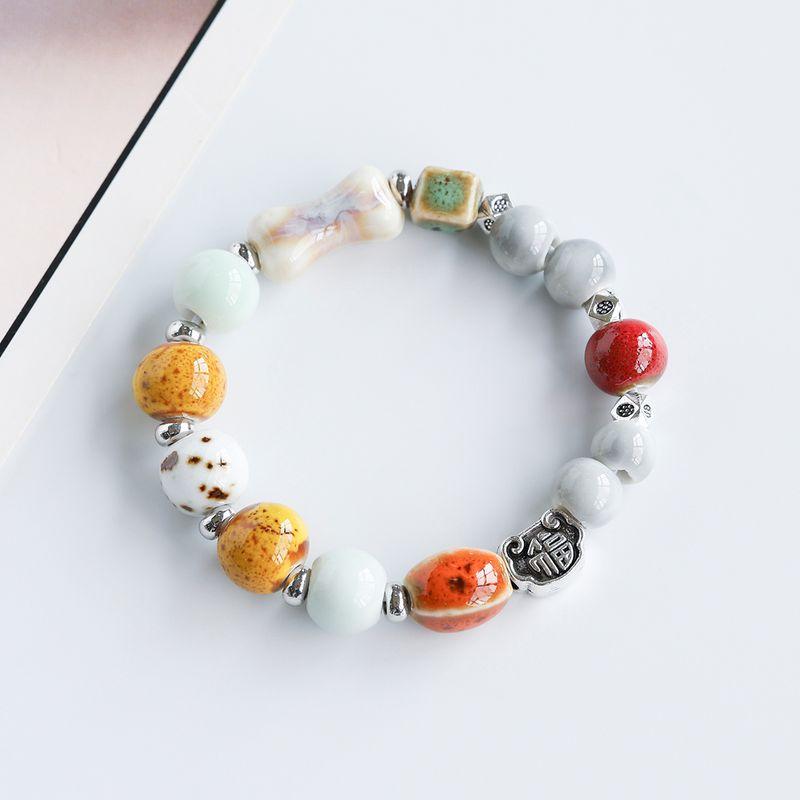

Стиль Национальная Мода Маленькие Украшения Пара Студенческий Ручной Браслет Ремешок для Ношения Цзиндэчжэнь Фарфоровые Бусины Браслет Керамический Браслет Этнический Стиль Flower Glaze Orange