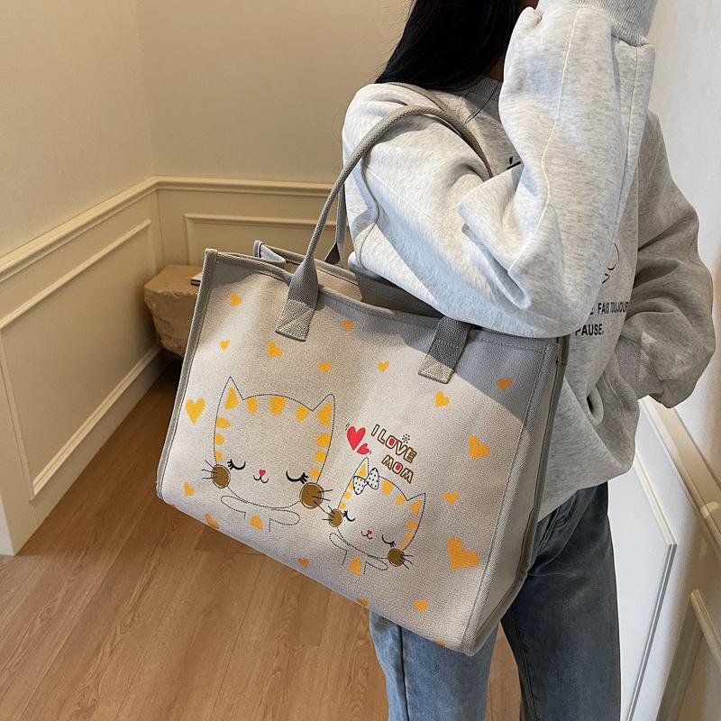 Large Capacity Canvas Bag Women's Spring and Summer 2025 New Versatile Student Class Commuter Bag Japanese and Korean Ins Tote Bag