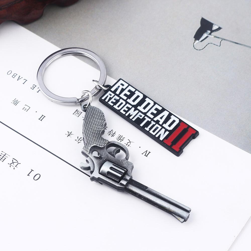 Portachiavi Revolver di Arthur Morgan di RDR2 Red Dead Redemption 2 Ciondolo Portachiavi Regalo per Fan Cosplay Per Uomini Donne Gioielli per Zaino