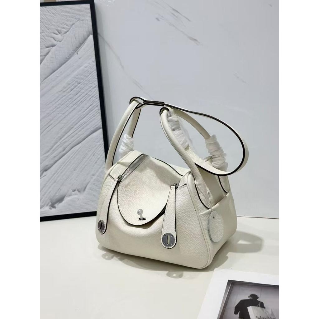 New leather pillow bag women's bag one-shoulder hand-held fashionable and versatile temperament mature woman bag