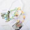 Flying Police Officer Doll Keychain with Bead Pom-Pom - Handmade and Cute Pendant for Bags or Phones