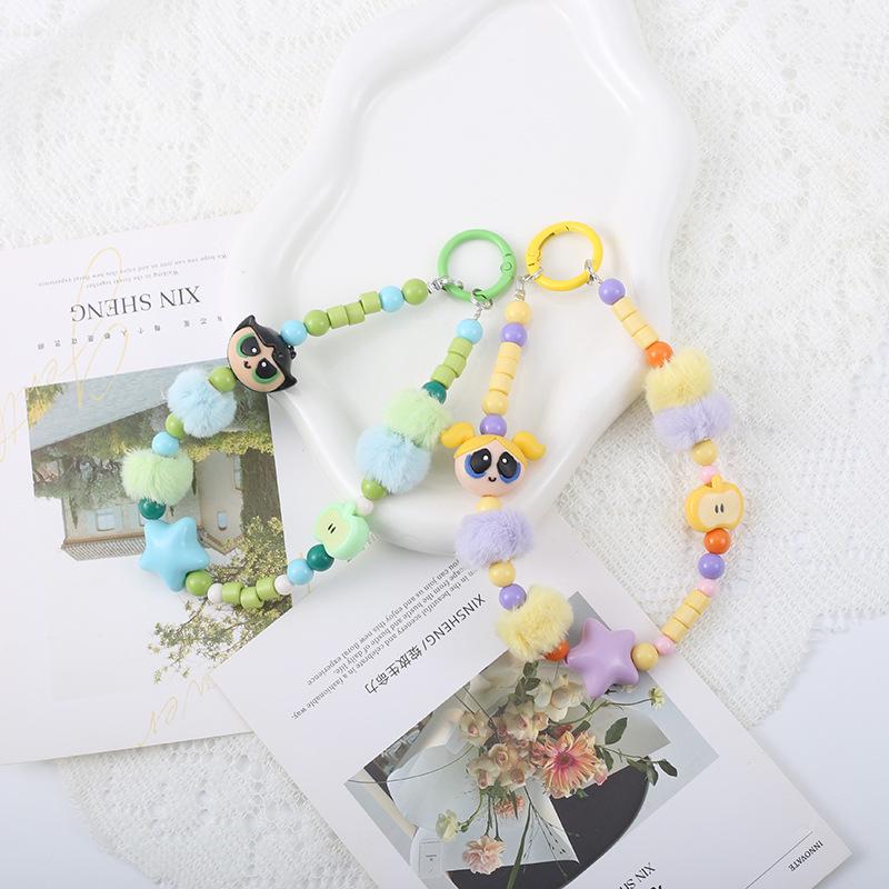 Flying Police Officer Doll Keychain with Bead Pom-Pom - Handmade and Cute Pendant for Bags or Phones