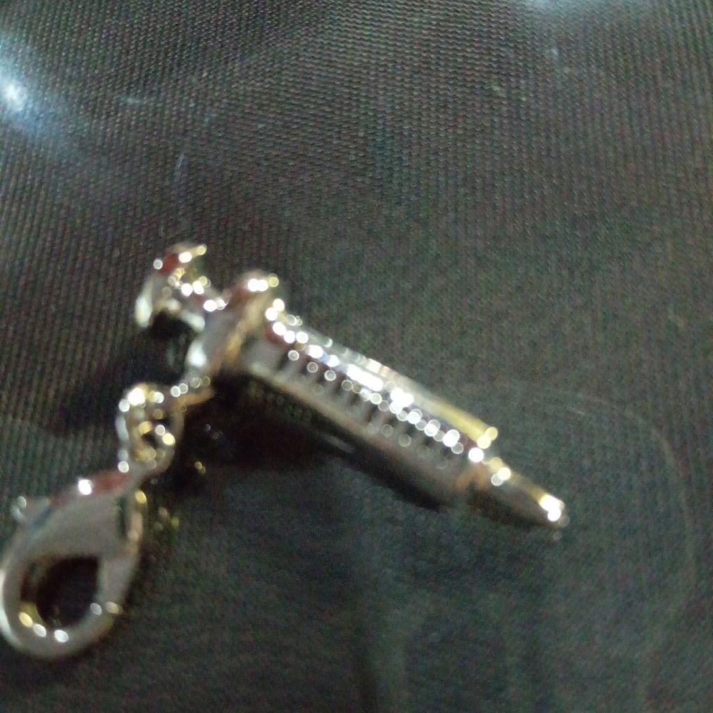 Used Q-pot Syringe-shaped silver charm approx. 2.3cm