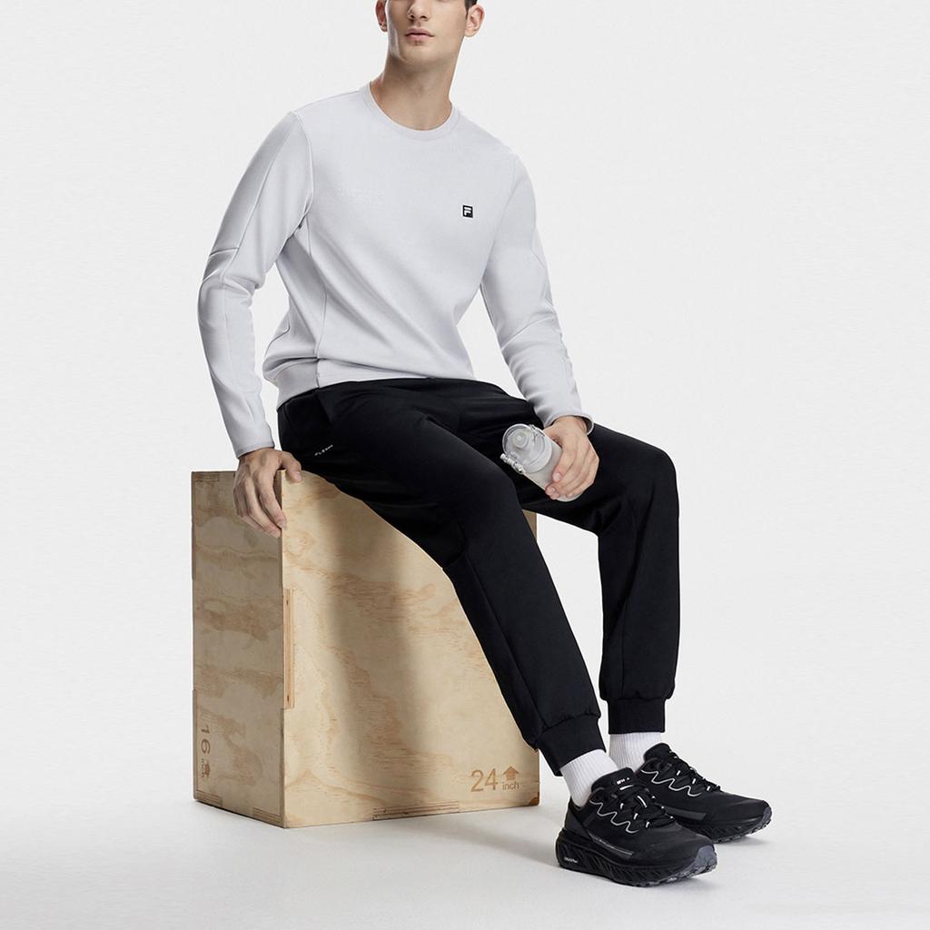 FILA Solid Color Elastic Cuffed Knitted Sports Pants Men bottoms Deep-Black A11M341605F-BK