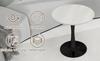 27.6-Inch black coffee table, mid-century modern style, for 2-4 people, round marble tabletop with a white veined finish, various settings.
