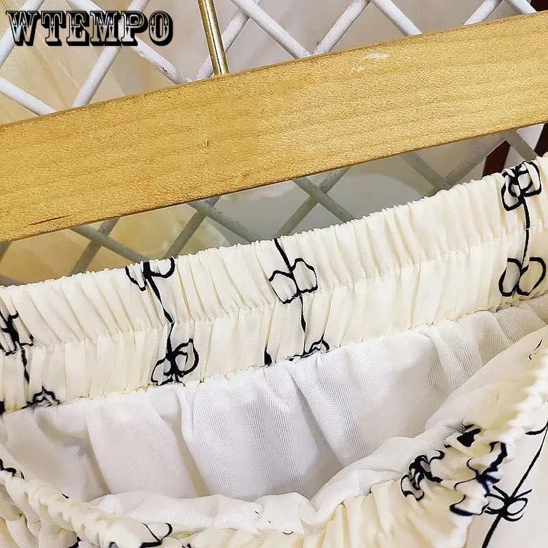 Wysoka talia i cienkie kwiaty Spódnica damska Elastyczny pas Średniej długości Spódnica trapezowa Codzienny Casual Wiosna i lato