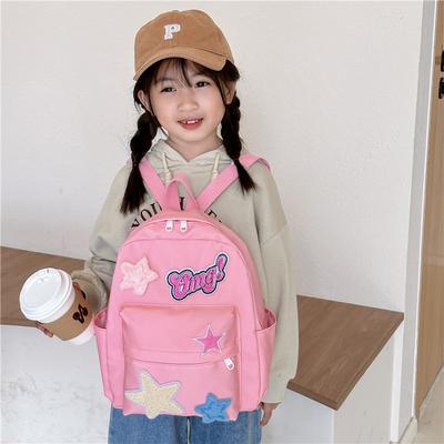 2025 Nova Mochila Escolar Infantil Elegante e Simples Jardim de Infância Crianças Médias e Mais Velhas Lona de Desenho Animado Cor Doce Estrela