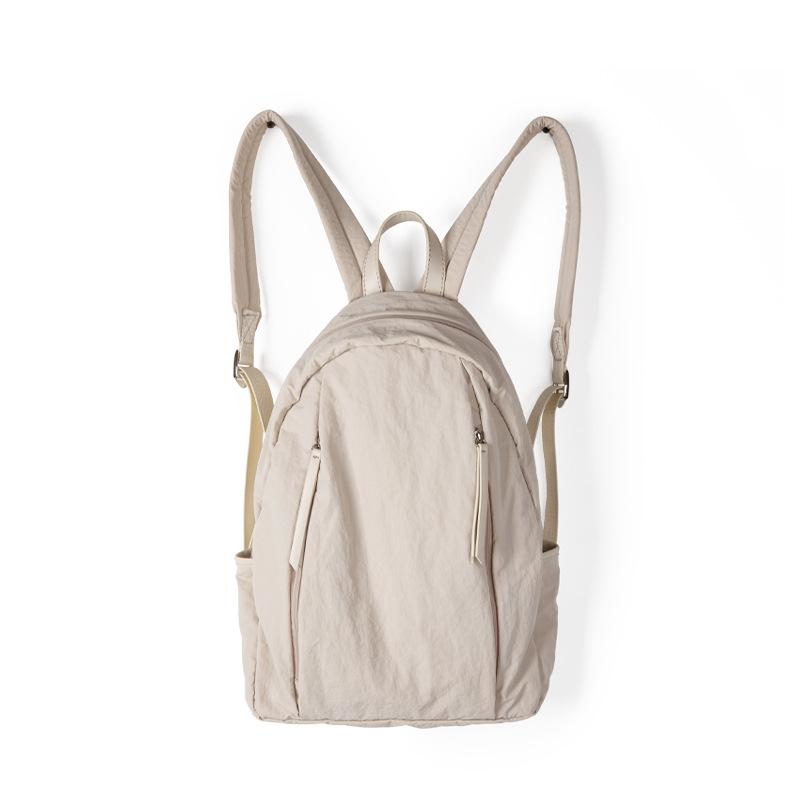 

Новый корейский вариант, нейлоновый рюкзак большой емкости для женщин, нишевый, в стиле Instagram, легкий, для путешествий, студенческий рюкзак для университета абрикосовый