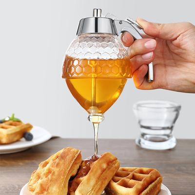 Dávkovač lisu na medový sirup, držák na sirup z džusu, stlačovací lahev na potravinářský olej, přenosný úložný hrnec, domácí kuchyňské úložné potřeby