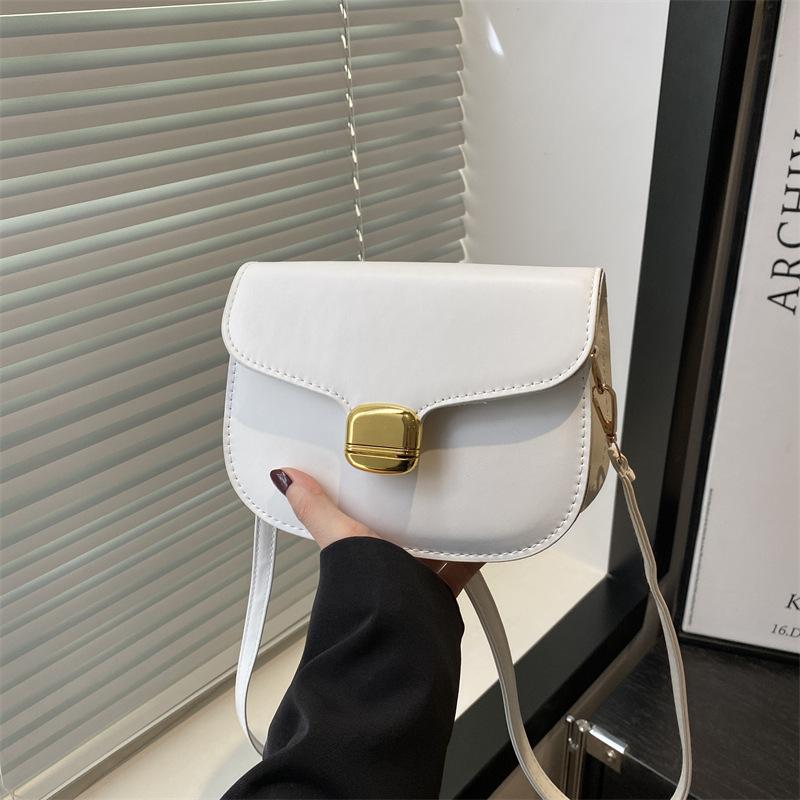 

Весна и лето новая универсальная однотонная простая высококачественная текстурная темпераментная сумка через плечо, сумка-мессенджер, сумка-седло, женская сумка белый