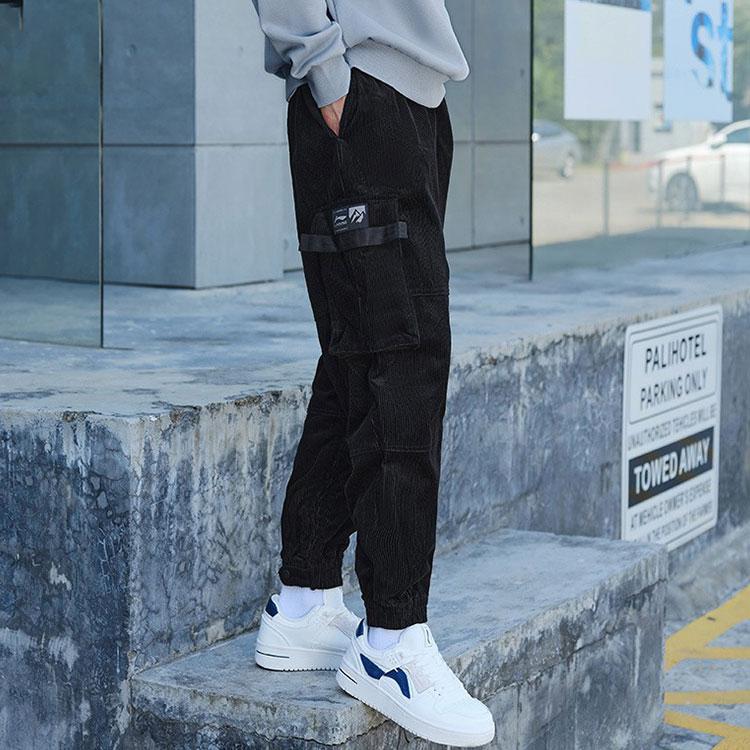 Li Ning Logo Patch Loose Fit Cuffed Casual Long Pants Knitted Sports Pants Men Bottoms Black AKXR459-1