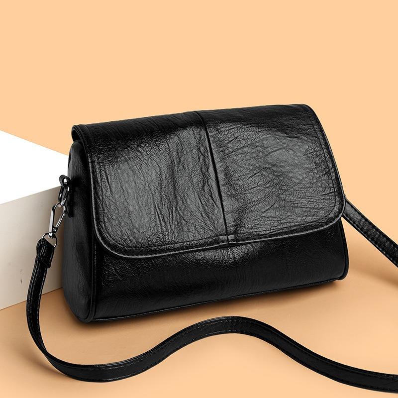 Large capacity bag women's new messenger bag commuting high sense fashion versatile atmosphere soft leather shoulder mother bag tide