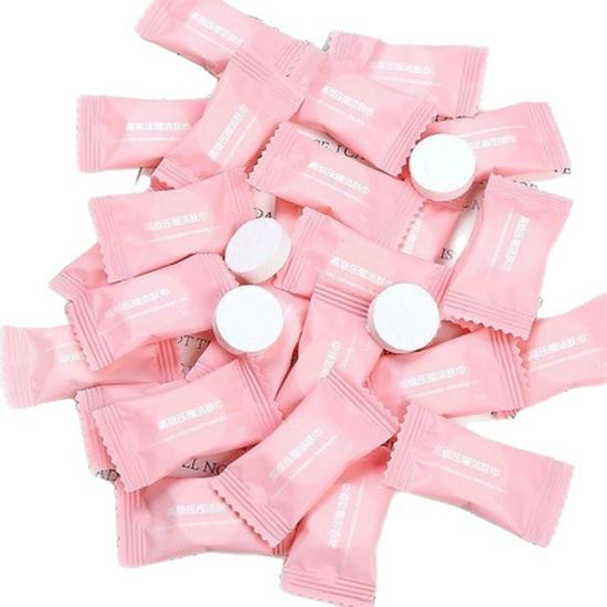 Compact Disposable Facial Towel - Candy Style Portable Cleansing Wipes for Travel, Business Trips, and Catering.