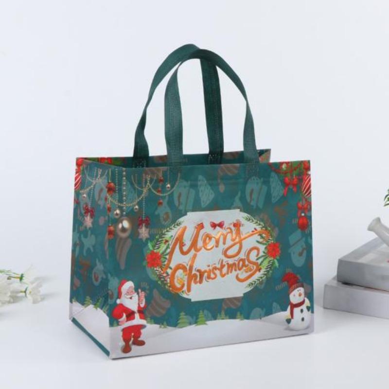 Borsa regalo di Natale Borsa per imballaggio regalo di caramelle in tessuto non tessuto di grande capacità con pupazzo di neve e design di Babbo Natale