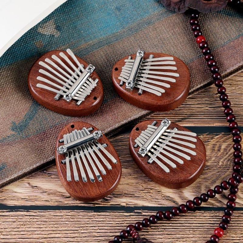 Bærbar Mini Sapele-plate med 8 nøkler Kalimba Nybegynnere Tommel Piano Gave