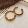 Maillard style retro tiger's eye stone round earrings women's autumn and winter high-end stud earrings small exquisite Internet celebrity jewelry