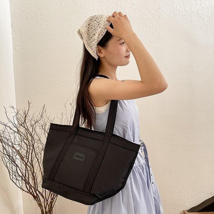 Spacious Nylon Canvas Tote Bag For Women Stylish Commuter Handheld Bag In Black And Cream