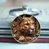 Round Metal Keychain Pendant Alloy Keyring with Detailed Animal Carving Design Durable Fashion Accessory for Keys Bags and Daily Use