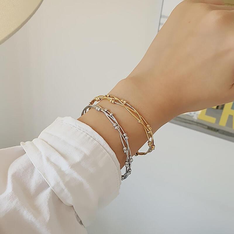 

Women s Twisted Bangle 15K Gold Simple Year-End Look Bracelet A25321_Silver