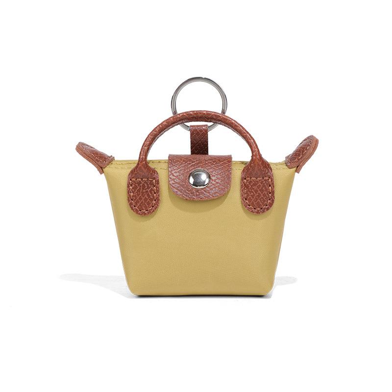 

Прямые продажи с фабрики ультра-мини легкая маленькая сумка-подвеска порт для наушников красный конверт модная и простая сумка-пельмень мини-сумка для хранения